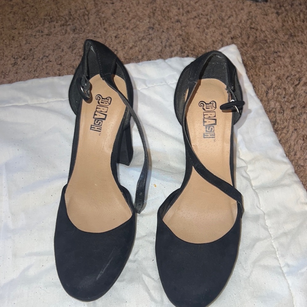 Brash Black High Platform Heels
Suede like, only worn few times. Size
 7.5